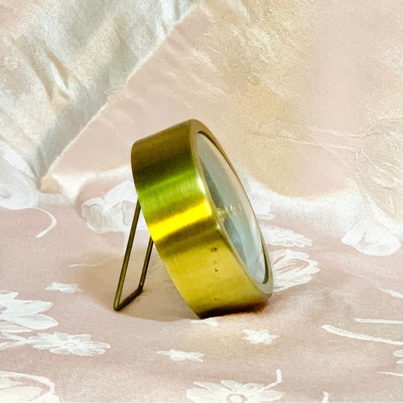 Modern Gold and Black Wall Clock with Minimalist Design - Picture 3 of 8